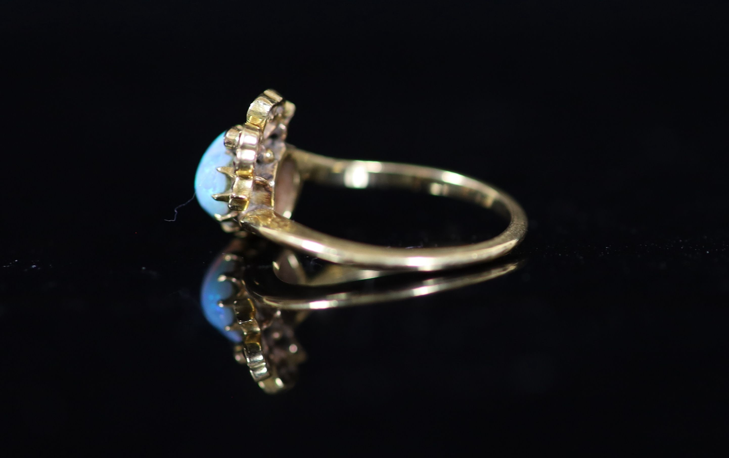 A late Victorian gold, heart shaped opal and diamond set crossover ring